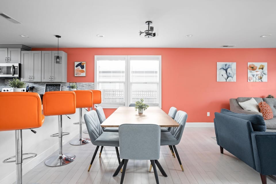 Dining Area: This area seamlessly connects the living area and kitchen, creating an atmosphere for socializing with the entire group!