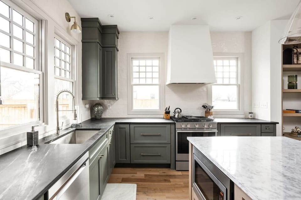 Kitchen: Bright countertops and modern appliances invite you to whip up your culinary creations!