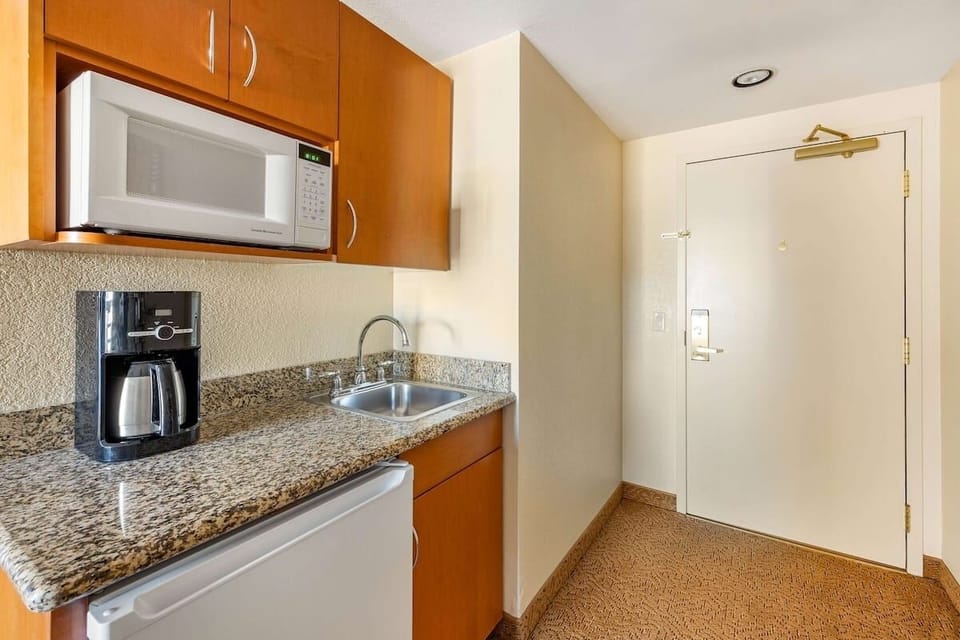 Fix morning coffee and snacks with handy kitchenette setup.