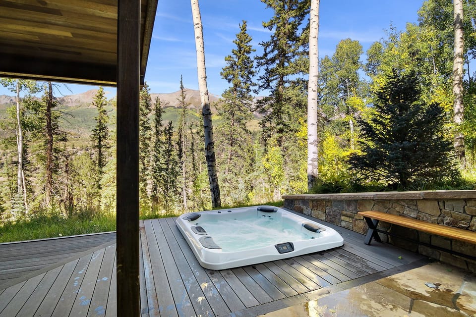The soaking tub is truly exceptional, offering breathtaking views of the San Sophia Ridge for a truly serene and luxurious experience.