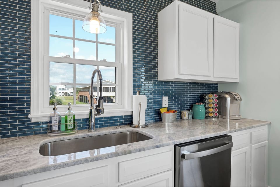 Fully stocked kitchen with coffee bar
