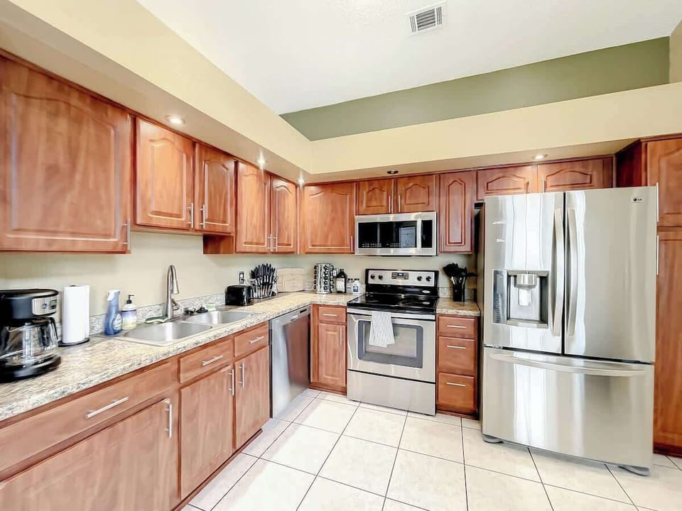 Our kitchen is ready for your culinary adventures, complete with all the modern conveniences.