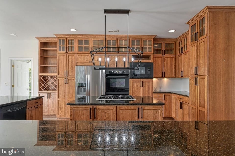 The kitchen is fully equipped and comfortable with 9 comfy stools for dining