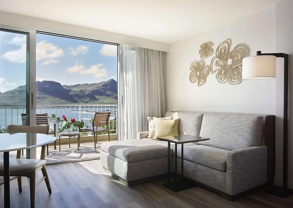 Unwind in crisp twin beds with bright, breezy island views.