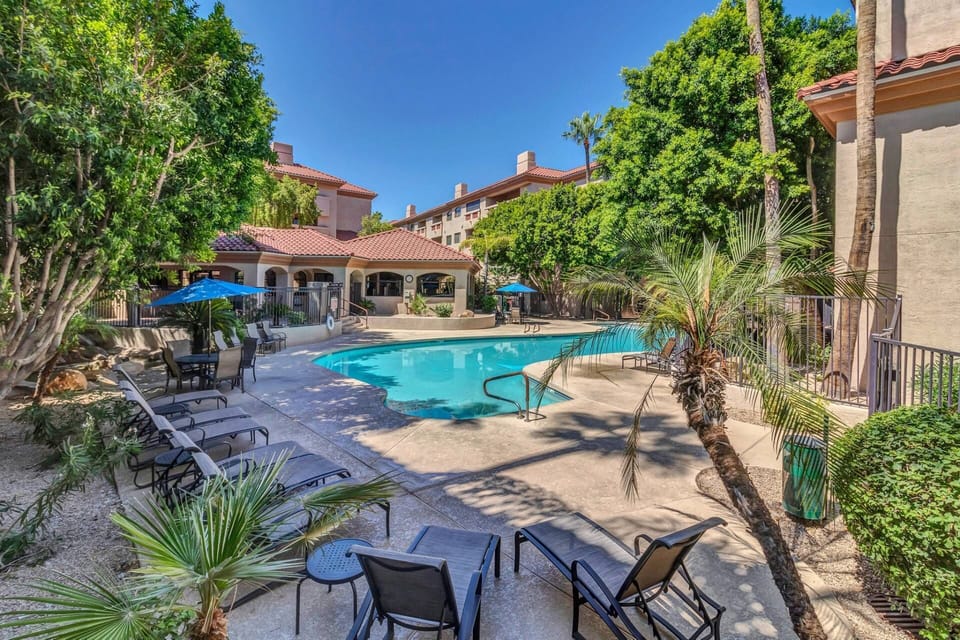 Community Pool and Spa with plenty of outdoor seating & lounging