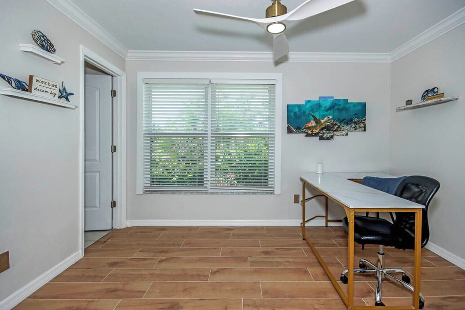 Queen bed now in the room and desk removed