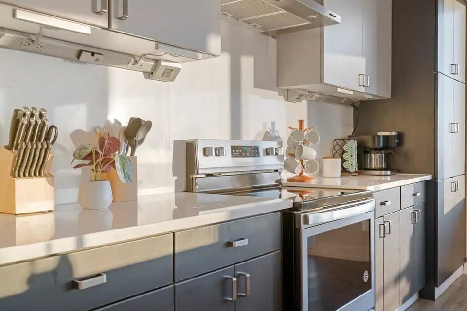 Sleek and functional! This modern kitchen features flat-panel cabinetry and gleaming countertops, making meal prep a breeze.