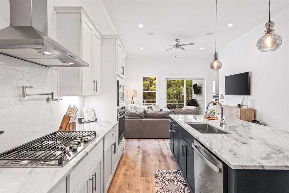 Well-equipped kitchen, featuring upscale appliances and sleek countertops