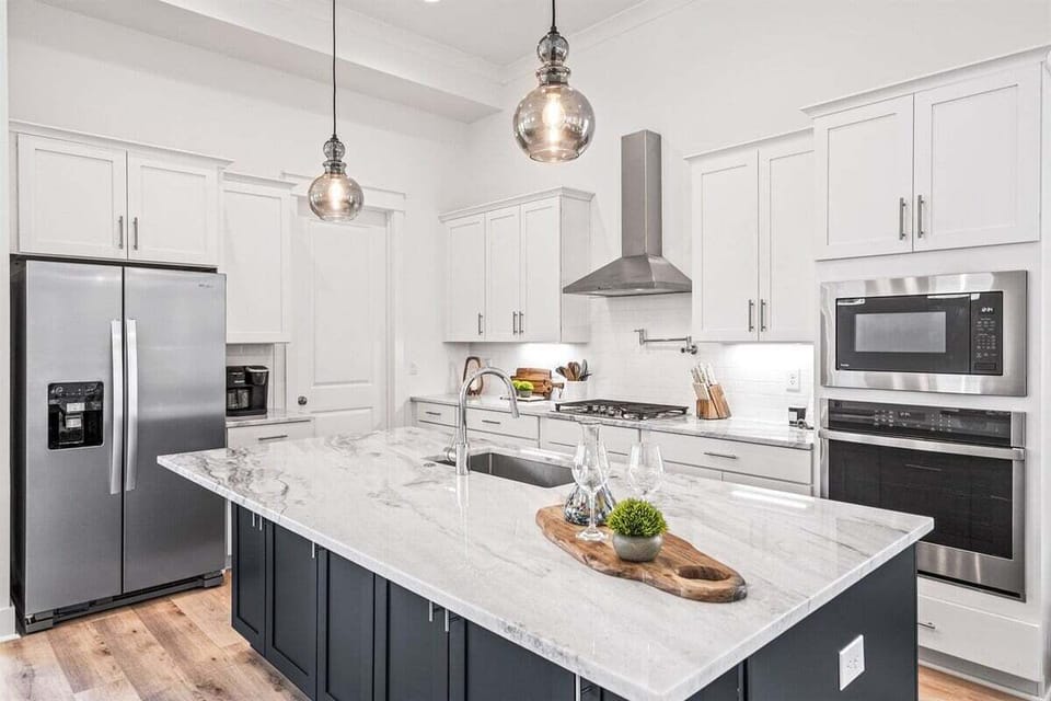 Well-equipped kitchen, featuring upscale appliances and sleek countertops