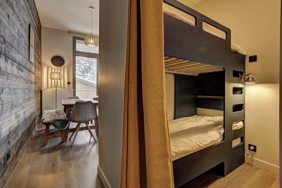 Child-size bunk beds off hallway