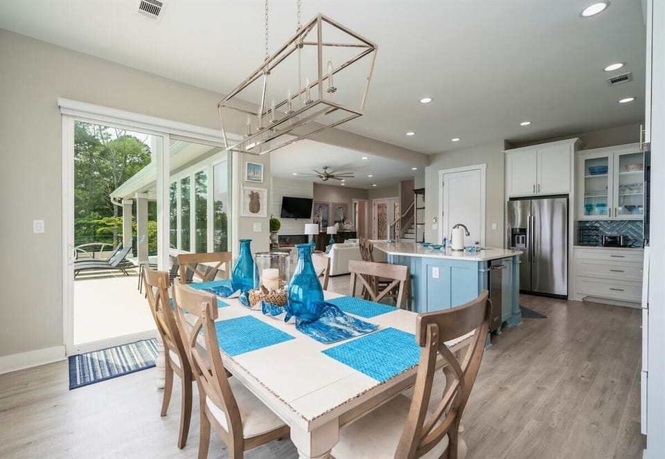 [Kitchen] After a Delicious Meal, Walk through the Sliding Doors to your Lakeside Oasis and Enjoy an Iconic Lake Hamilton Sunset.