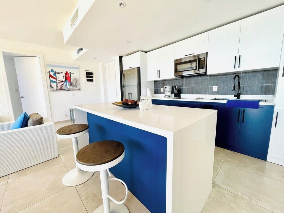 Experience the epitome of contemporary style in our newly renovated kitchen.  Every detail has been carefully crafted to create a sleek and modern aesthetic.  From the state-of-the-art appliances to the stylish countertops and fixtures, this culinary haven is designed to inspire your inner chef and elevate your cooking experience.  