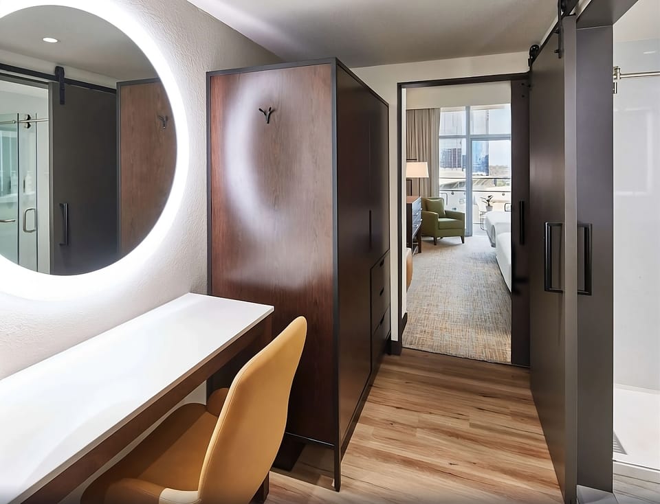 Get ready with a sleek vanity and generous closet storage.