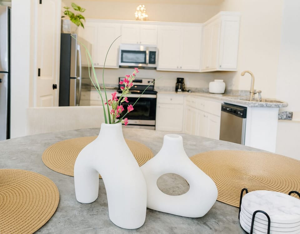 Beautifully decorated and clean kitchen and dining area.
