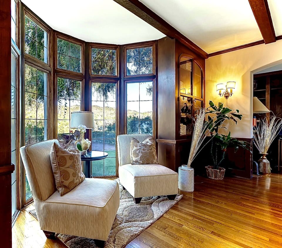 Living Room Bay Window with Top Hill View of Mountain