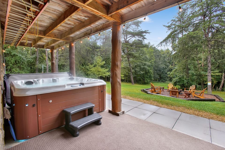 This hot tub and outdoor space is sure to be the favorite hang-out spot for you and your loved ones!