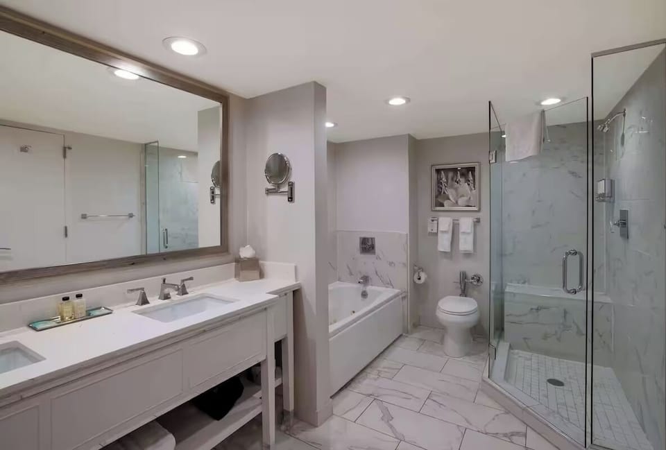Refresh in a bright, spa-like bath with glass shower.