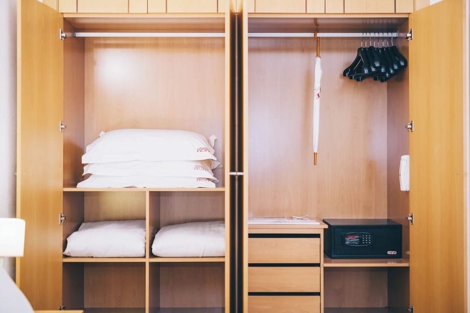 Unpack with ease using spacious wardrobe and in-room safe.