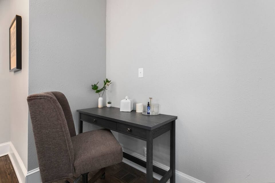 Lower level work station with desk and chair