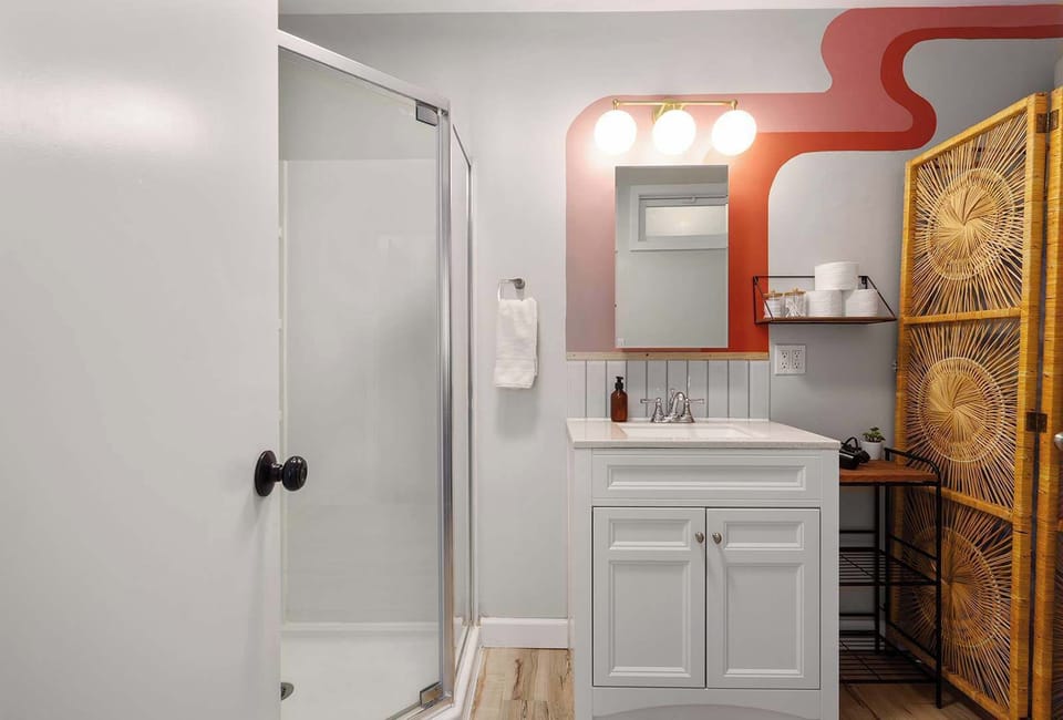 Have a little fun getting ready for the day in the second full bathroom.