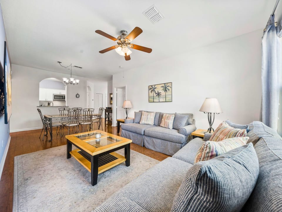 Bright open living space — perfect for family movie nights after the parks