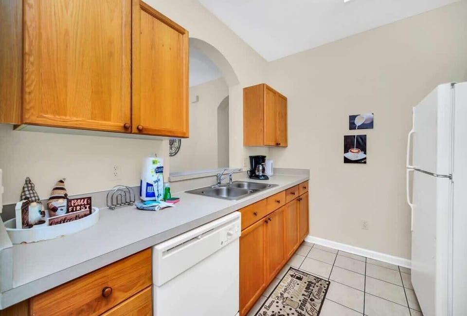 Kitchen is equipped with all the essential.