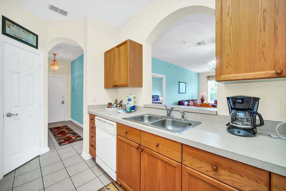 Kitchen is equipped with all the essential.