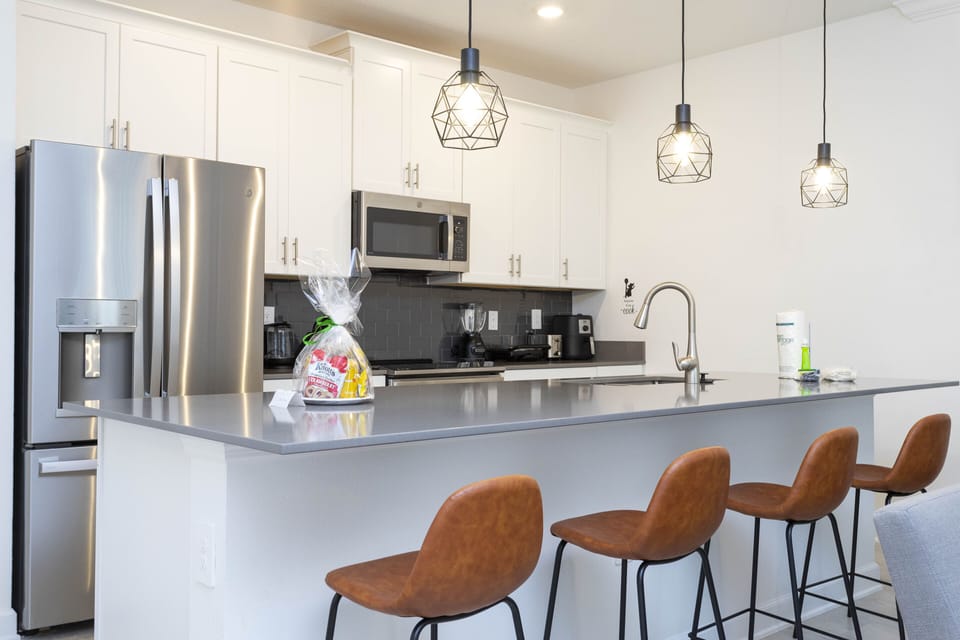 Fall in love for modern luxury with our stunning open kitchen—a beautiful, vibrant space that seamlessly combines style and functionality. a family-friendly retreat where the joy of cooking meets the warmth of togetherness.
