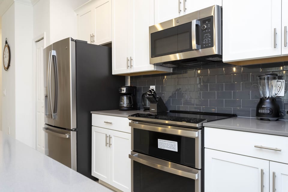 A fully equipped and comfortable kitchen ready for family gatherings where you can feel as cozy as home. Microwave, oven, dishwasher, refrigerator and stove available for you to cook.