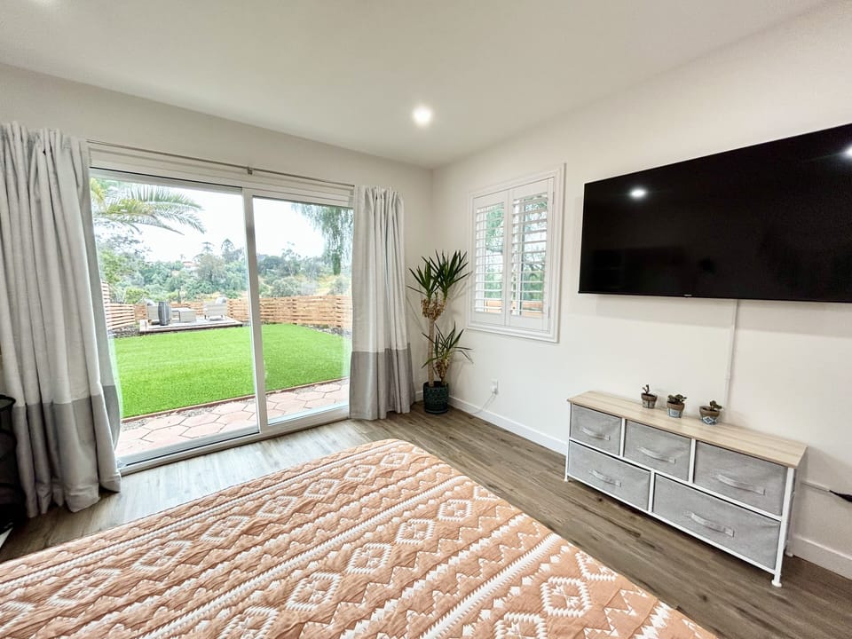 Enjoy watching something on the 55-inch TV or staring out the window!