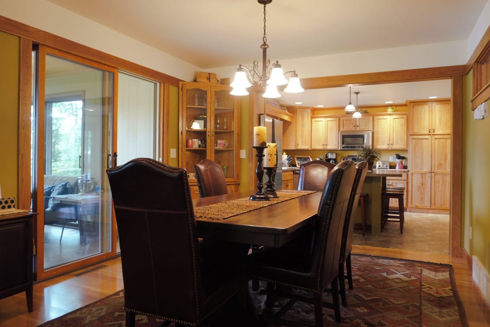 Dining table seats 6.  Island seats 4.