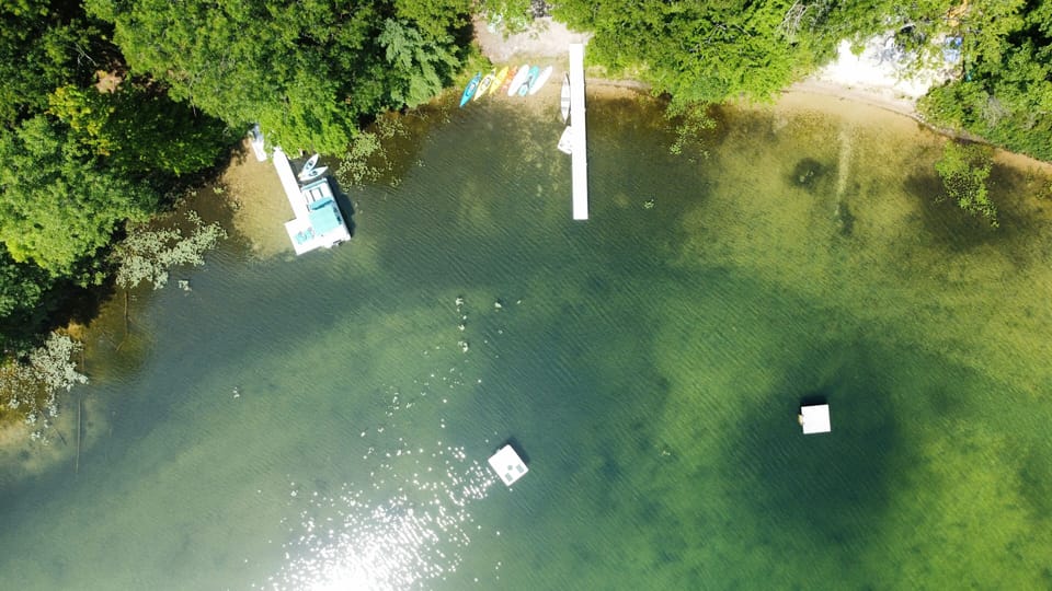 EXTERIOR:  Another aerial view of the private lakefront.
