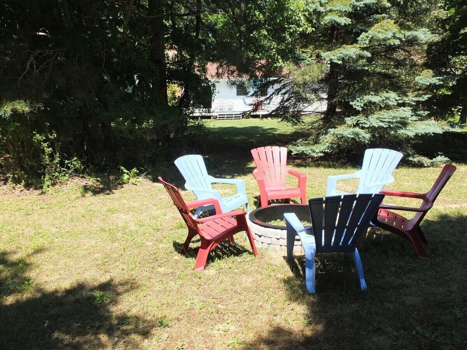 EXTERIOR:  Another view of the backyard bonfire ring.