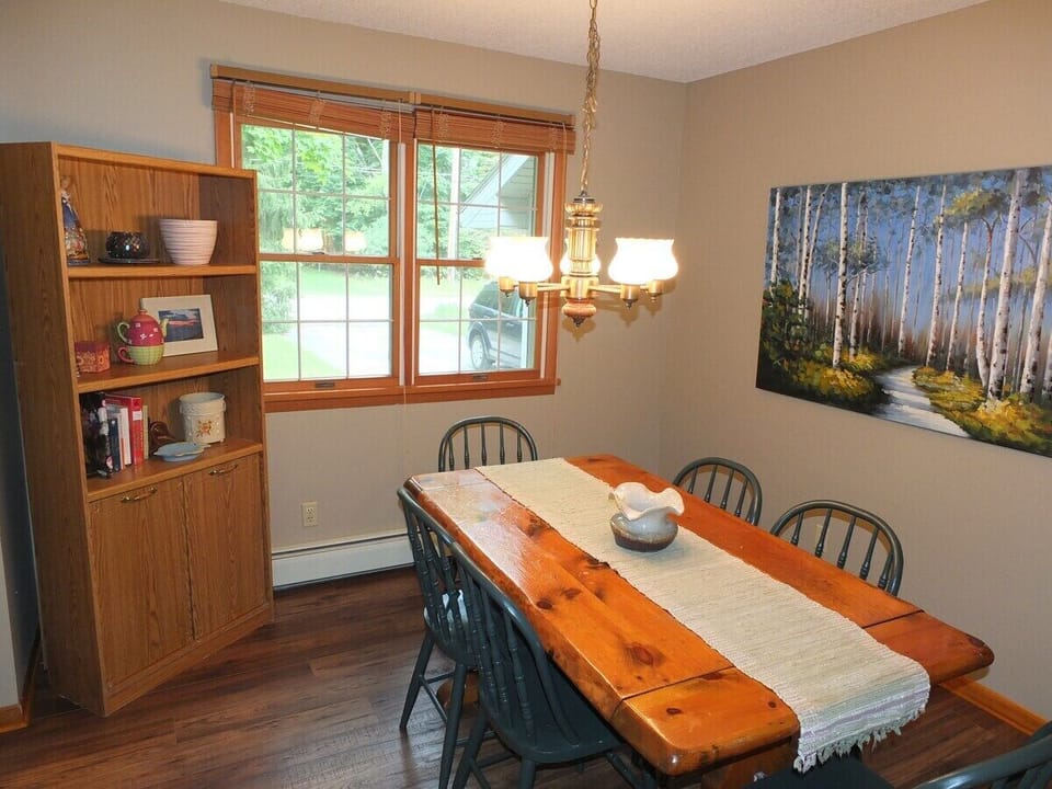 DINING ROOM:  The home has a lovely dining room with table and chairs for 6 adults