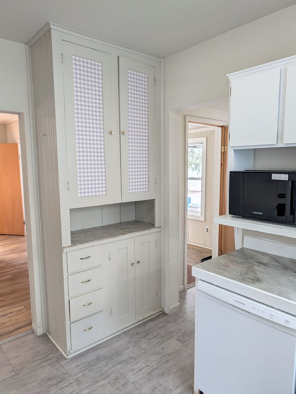 KITCHEN:  Recently updated kitchen with all appliances including a dishwasher and a good supply of cooking and dining utensils.