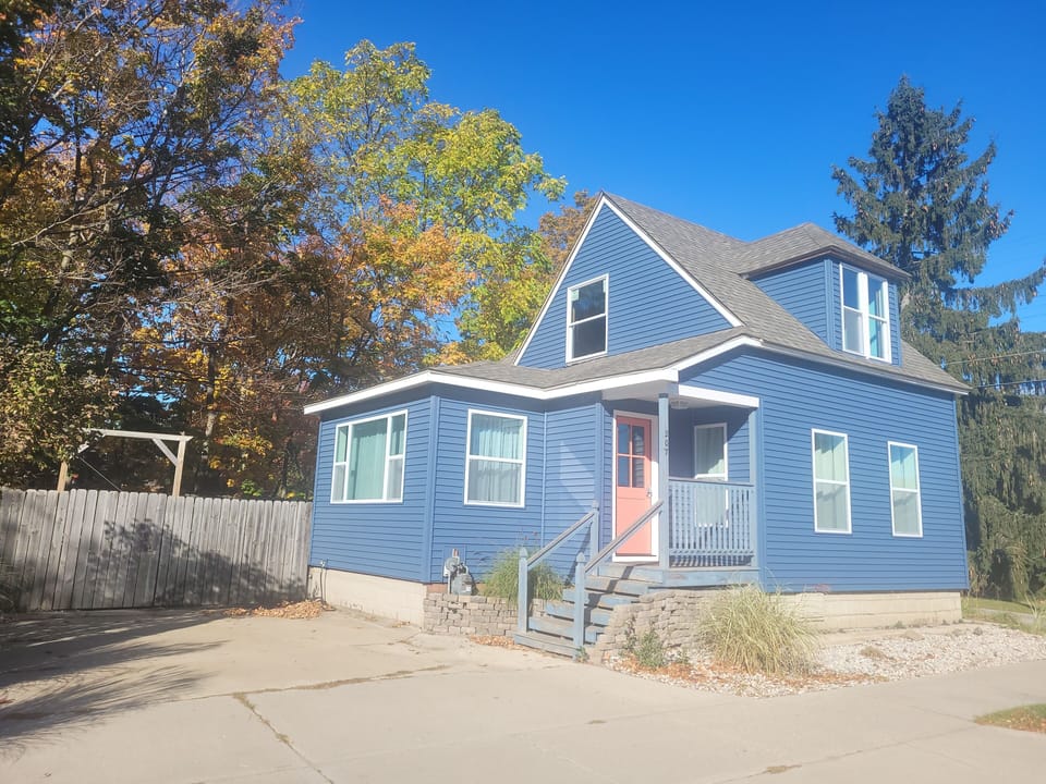 OVERVIEW:  The front of the home in early Fall