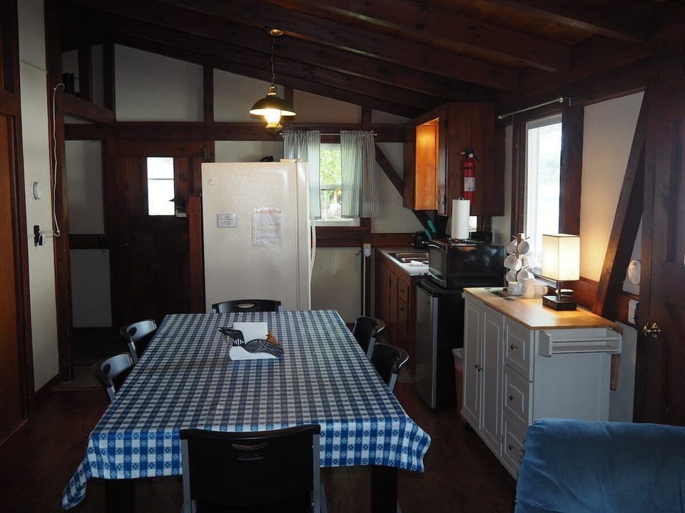 DINING AREA:  The cottage has a nice dining area with a table and chairs for 6 adults.