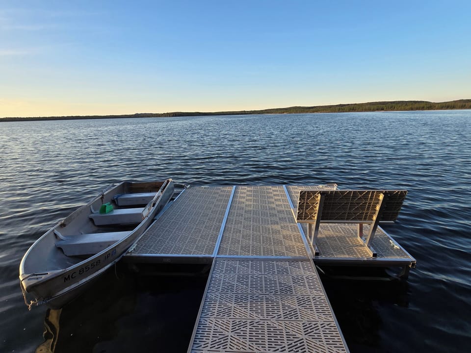 EXTERIOR:  The private dock with Little Platte Lake in the background