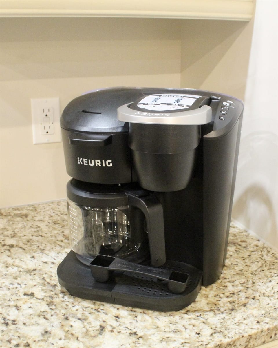 Keurig with Coffee Pods and Tea Bags Provided