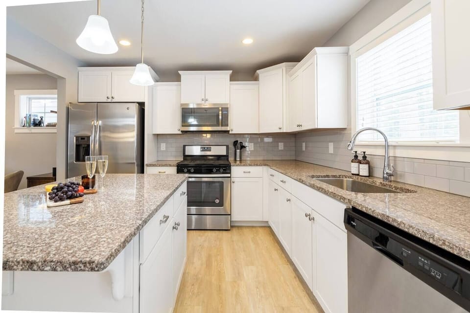 Fresh kitchen stocked for cooking.  All new stainless steel appliances.  