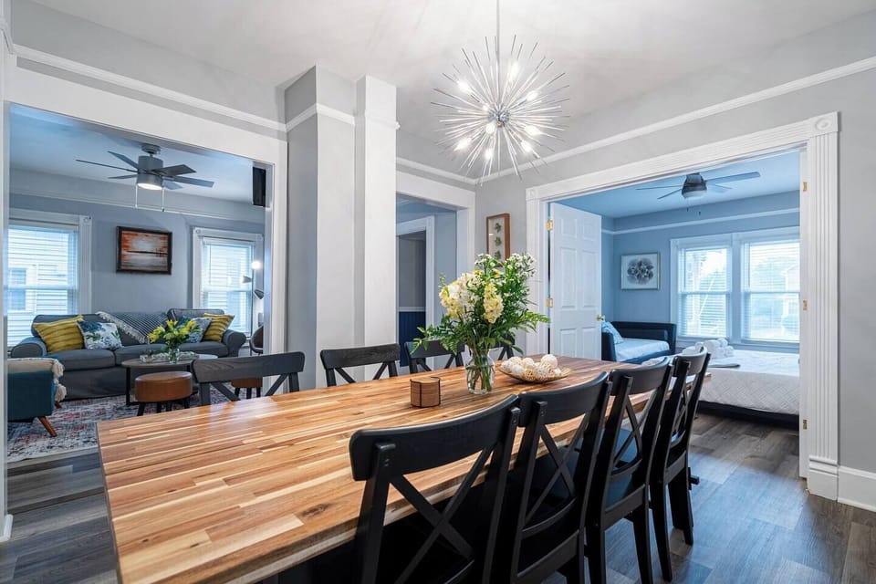 The dining area opens to the living room and French doors lead you into the master bedroom.