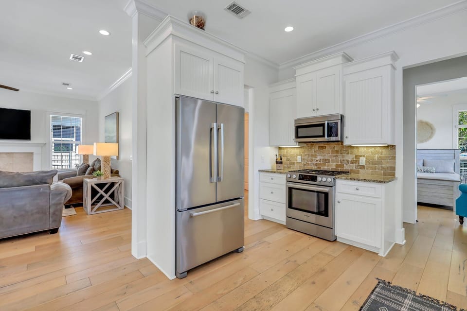 Kitchen with granite counter tops and stainless steel appliances