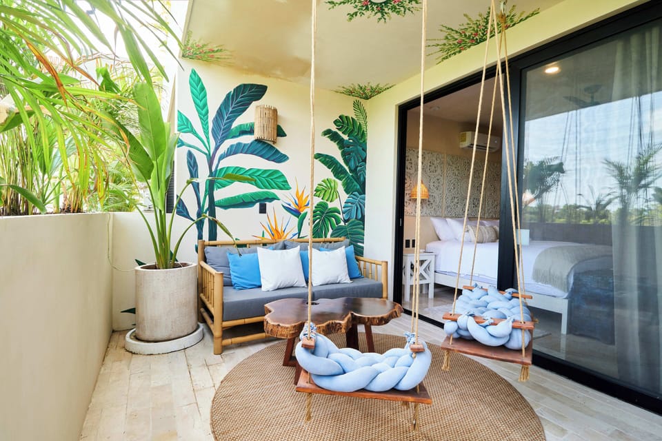 Back porch on the 1st floor with amazing artwork on the wall and ceiling.