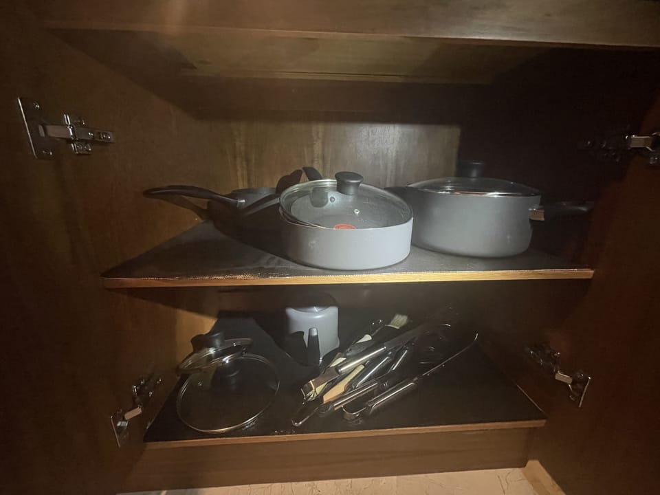 Pots, pans, and BBQ utensils for you to use.