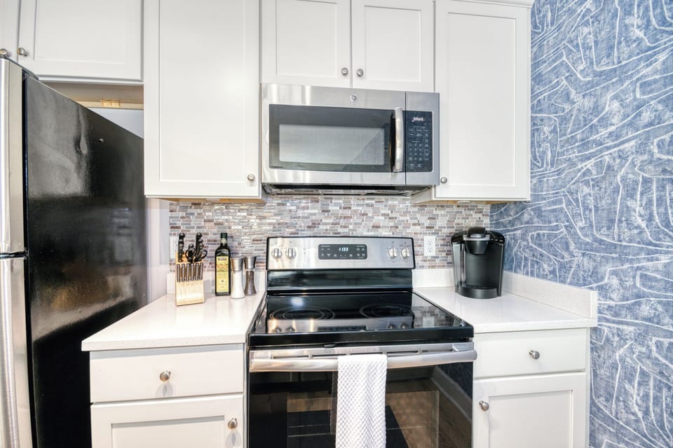 Stove top, microwave, and coffee machine available