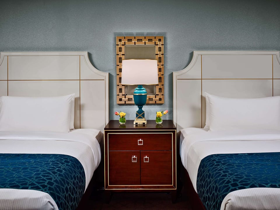 Drift off easily with cozy lighting and hotel-fresh bedding.