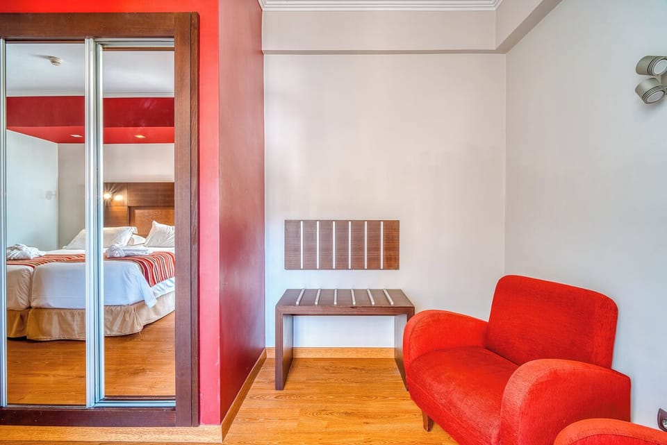 Drop your bags and lounge in a cozy corner chair.