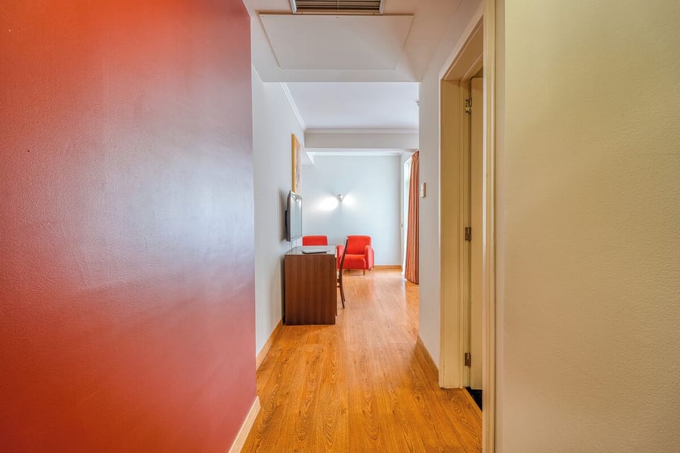 Stroll through the bright entryway into your relaxing suite.