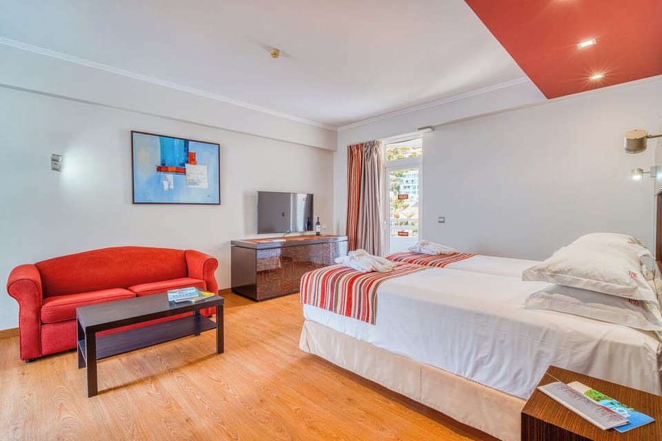Recharge after adventures in a calm, airy suite setting.