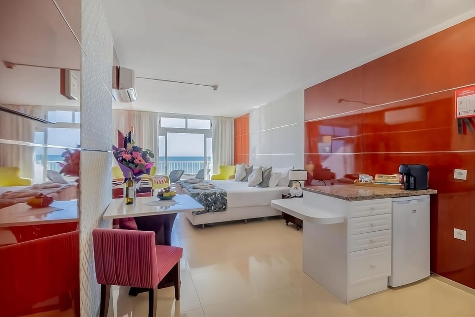 Unwind in a bright studio with kitchenette and ocean views.